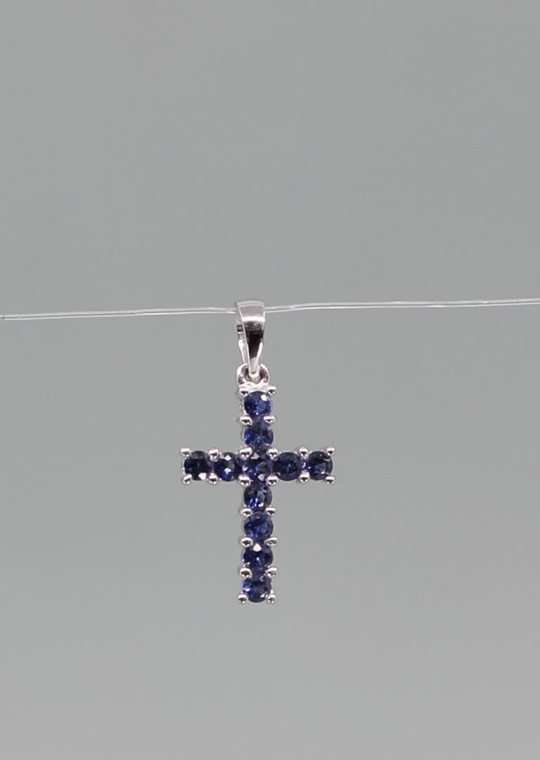 14K Gold Blue Sapphire Necklace Pendant: 3/4" by 1/4". Weight is .79 grams.