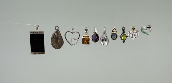 Group Of Sterling Silver Necklace Pendants