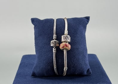 Pair Of Sterling Silver Pandora Charm Bracelets