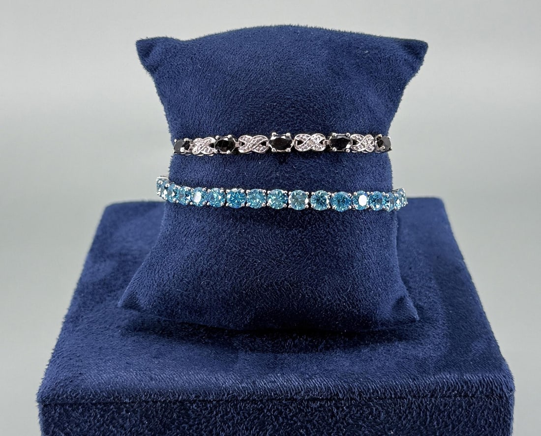 Adjustable Sterling Silver Bracelets: Two total. 15.35 grams combined weight.