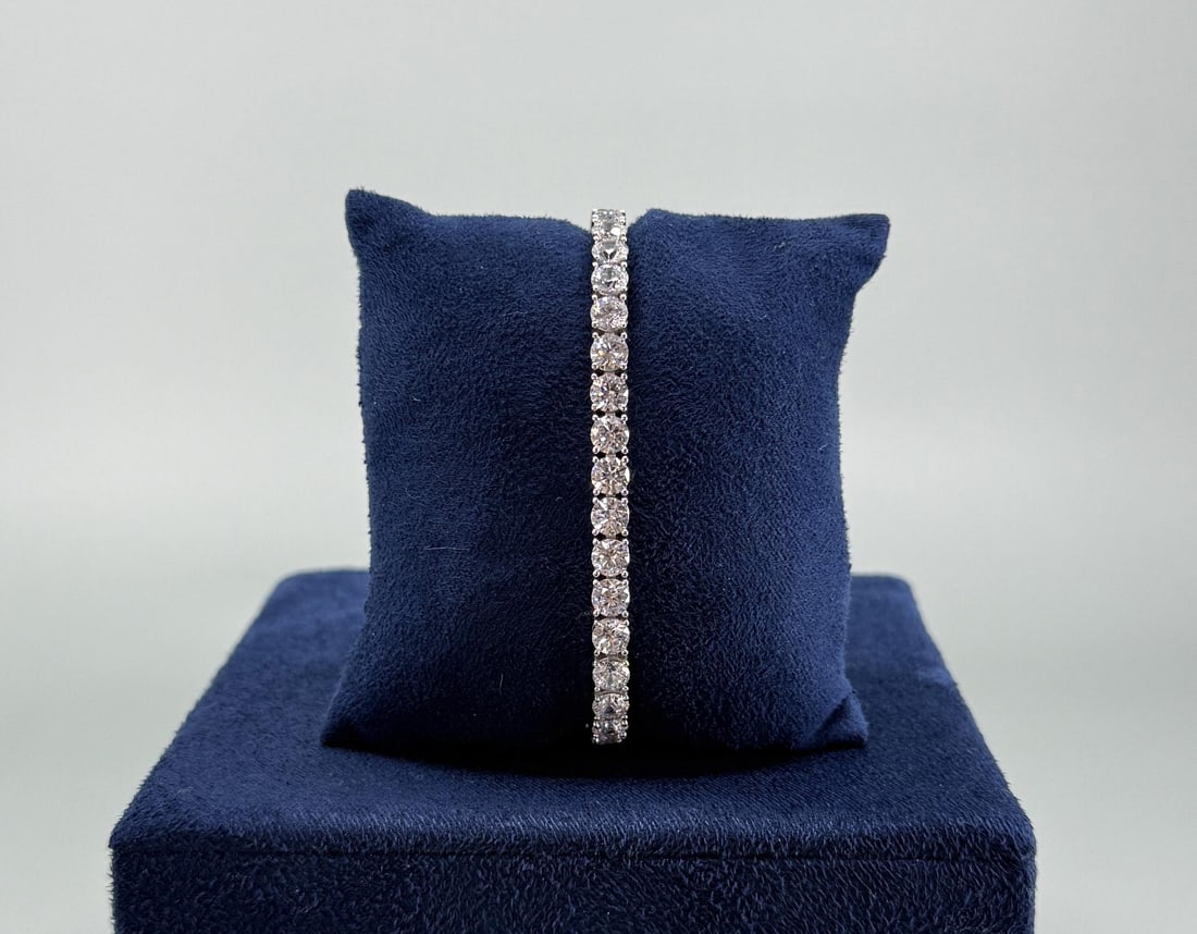 Sterling Silver CZ Tennis Bracelet: 7 3/4" long open. 20.02 grams.