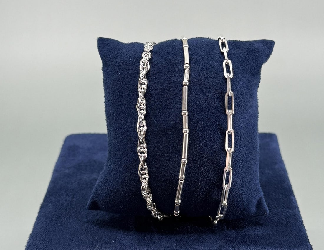 Group Of Sterling Silver Link Bracelets: Longest is 9" long open. 16.97 grams combined weight.