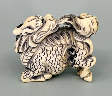 Japanese Dragon Netsuke Montana Residents Only: 1 3/8" by 1 1/4" by 1/2". Montana Residents Only. No shipping outside of the state of Montana. Only for sale to Montana Residents. Anyone else bidding, who does not reside in the state will have