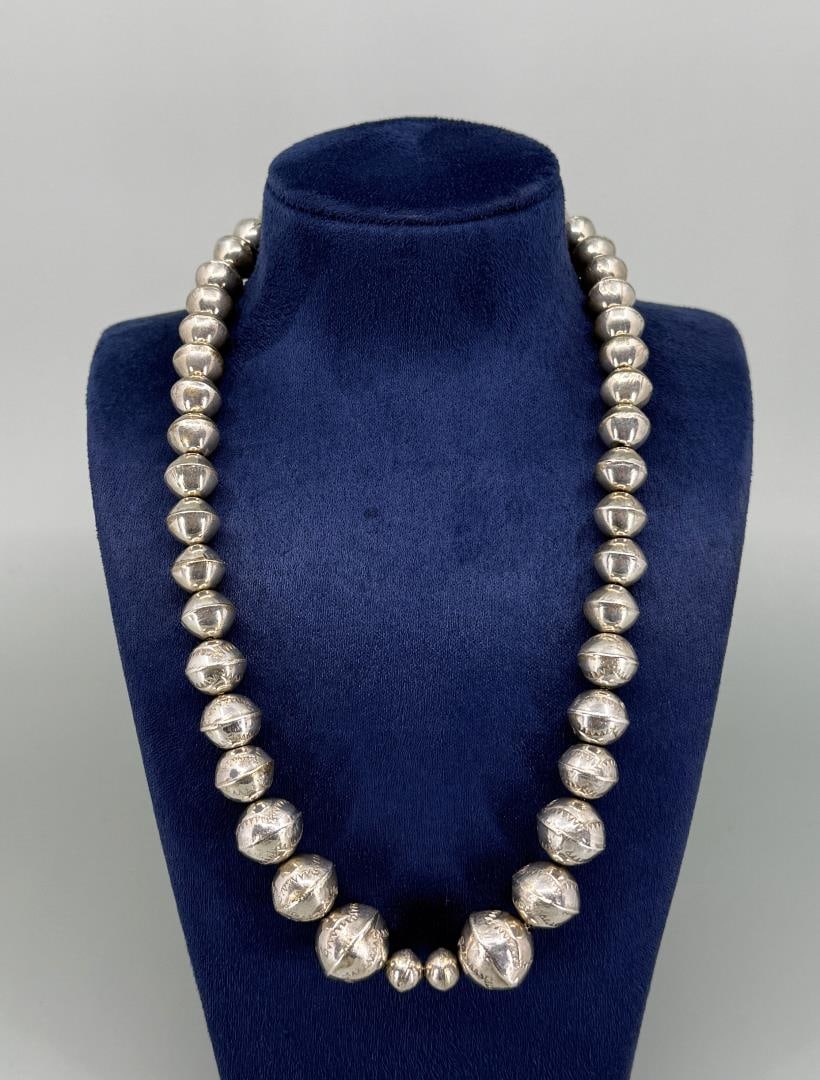 Navajo Sterling Silver Graduated Pearls Necklace: 33 grams. 9 3/4" long closed.