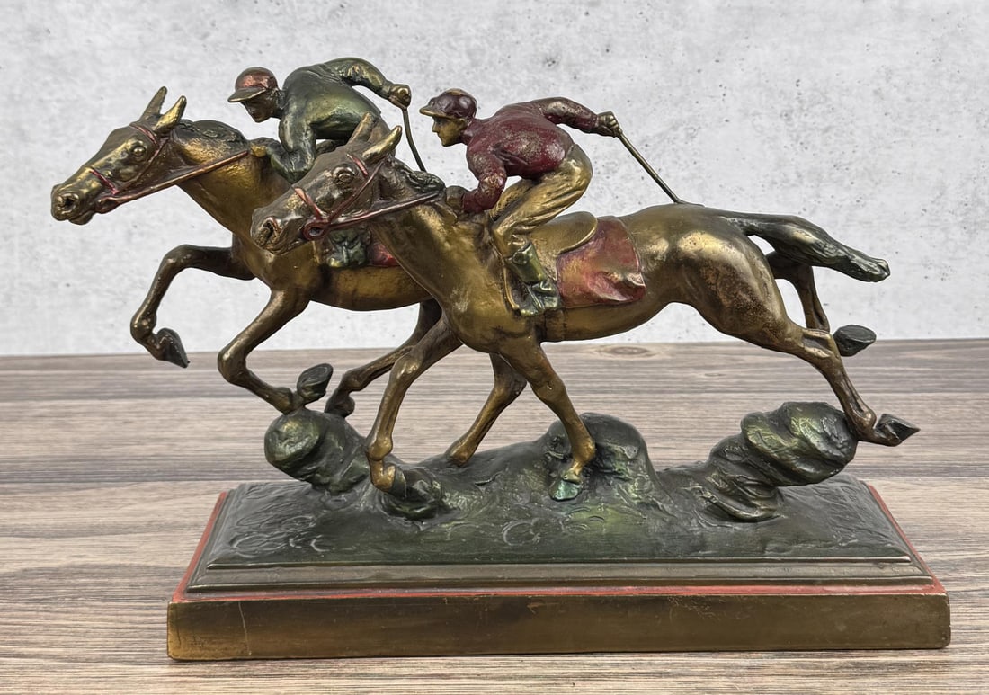 Paul Herzel Cold Painted Spelter Sculpture: Title is Turning Home. 16 3/4" by 11 1/8" by 6 3/4"