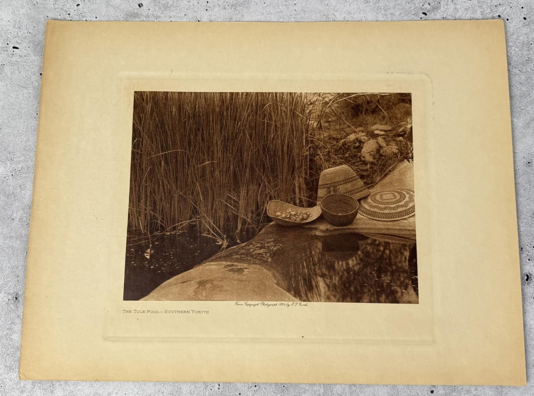 Edward Curtis Photogravure The Tule Pool: The Tule Pool Southern Yokuts. Original 1924 photogravure from Edward Curtis The North American Indian. 9 1/2" by 12 1/2".