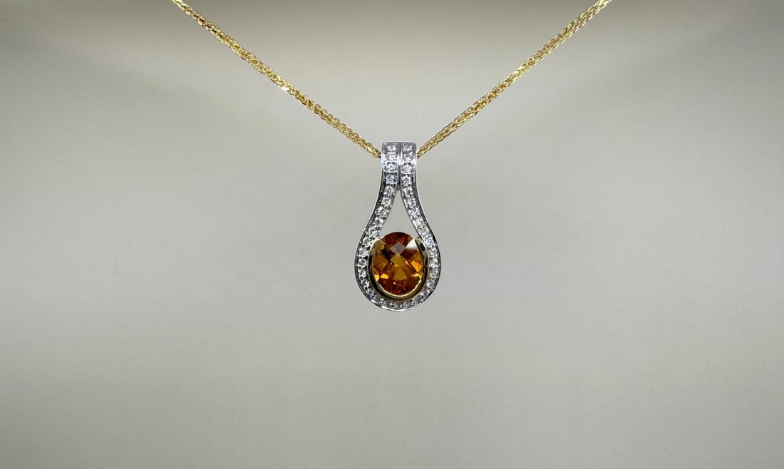 14K Gold Diamond & Citrine Necklace: 9 5/8" long closed. 6.71 grams total weight. .25ct Total Weight Diamonds, 1.5ct Citrine. Provenance: Factory new, from the estate of RP Ellis Missoula, Montana.