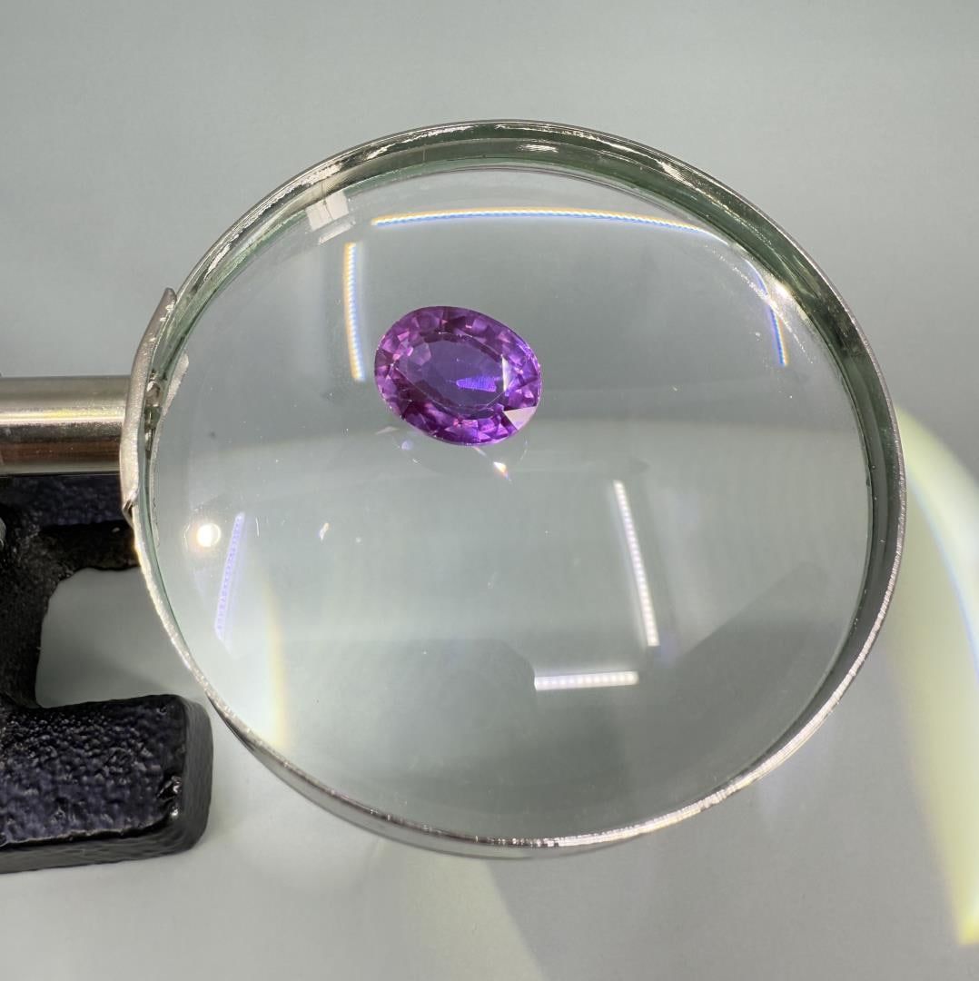 9.38 Carat Oval Synthetic Purple Sapphire: Provenance: From the estate of RP Ellis Missoula, Montana.