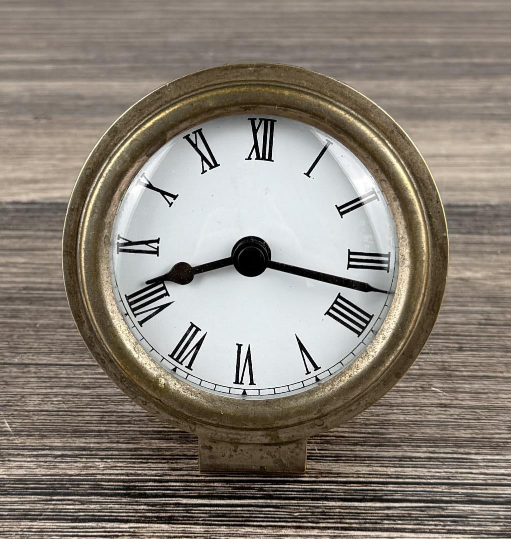 Silver Plate Quartz Desk Clock: 3 3/4" by 3 1/2" by 2 3/4". Untested.