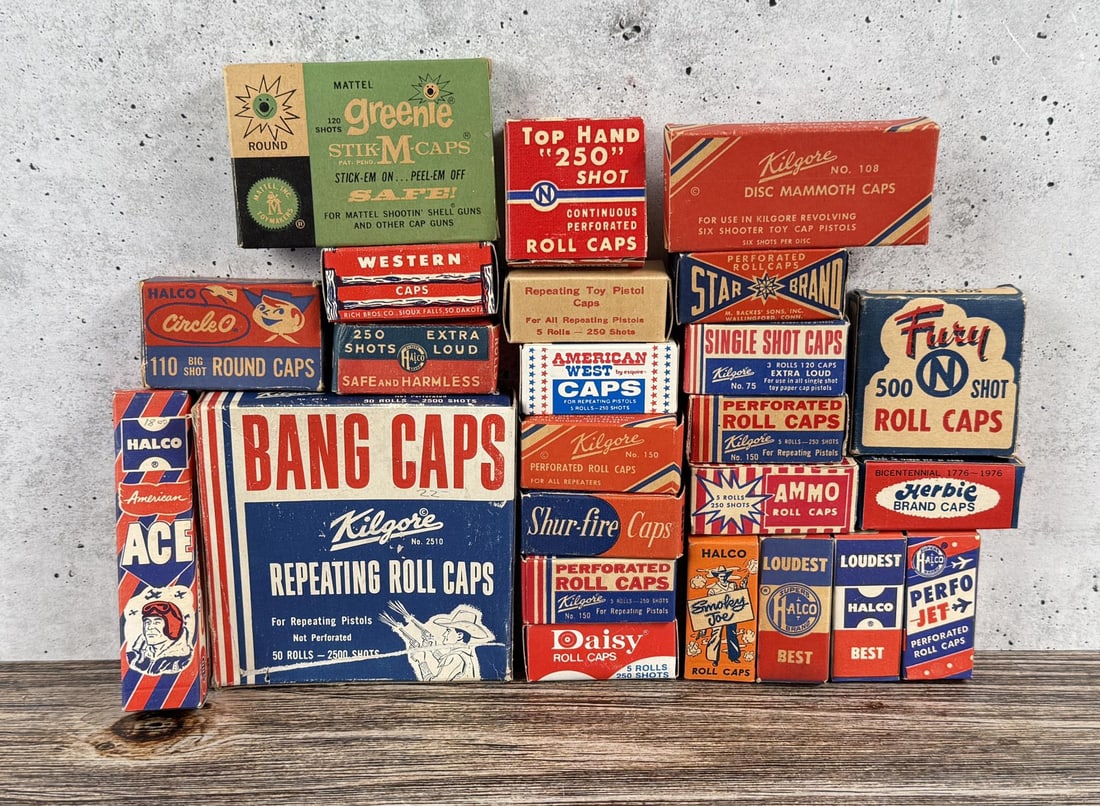 Collection of Cap Gun Roll Cap Boxes: 3 empty boxes, the rest have contents.