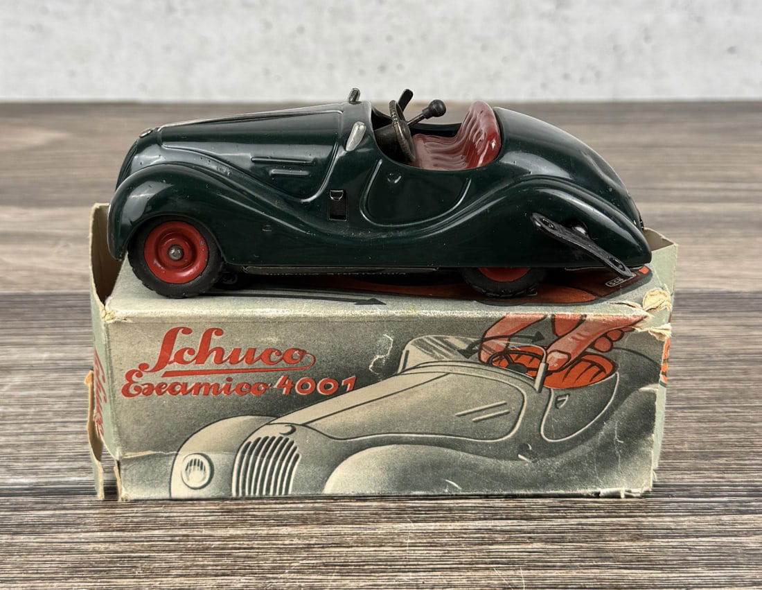Schuco Examico 4001 Wind Up Toy Car: Comes with original box. Working.