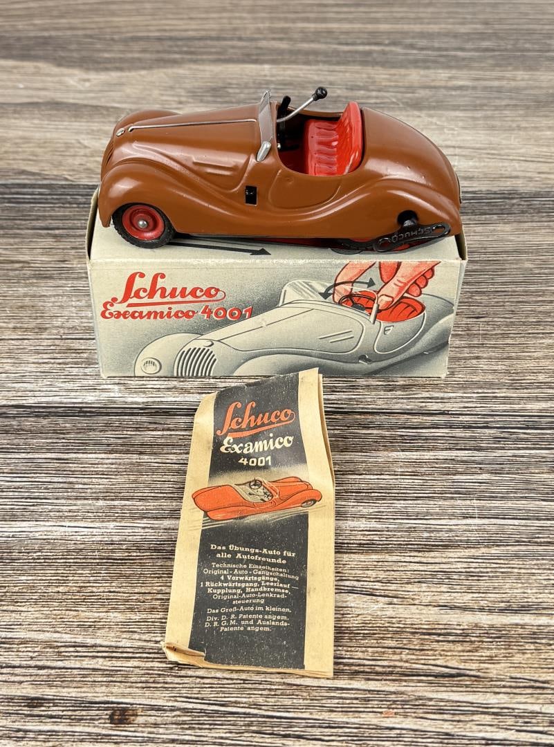 Schuco Examico 4001 Wind Up Toy Car: Working in original box. No steering wheel.