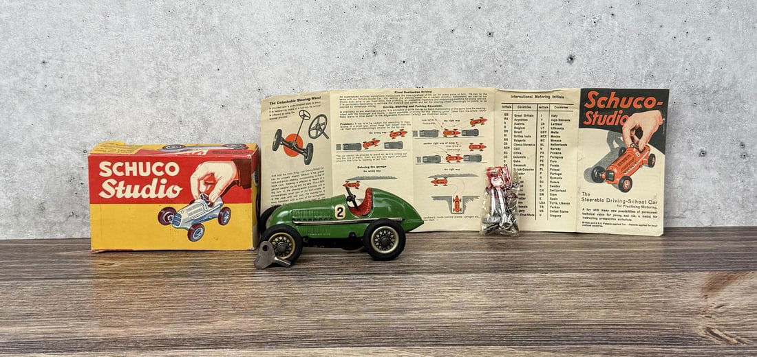 Schuco Studio 1050 Wind Up Toy Car: Working in original box.