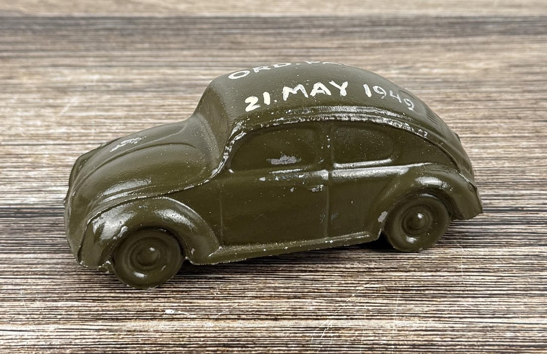 Korean War Ordnance Party US Army Paperweight: Volkswagen Bug Cast Aluminum Paperweight. 4 3/4" by 2" by 1 3/4".