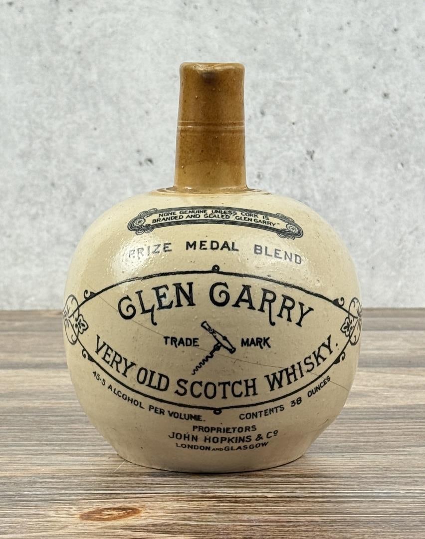 Glen Garry Scotch Whisky Jug: Cracked. 7 1/2" tall, 5 5/8" diameter.
