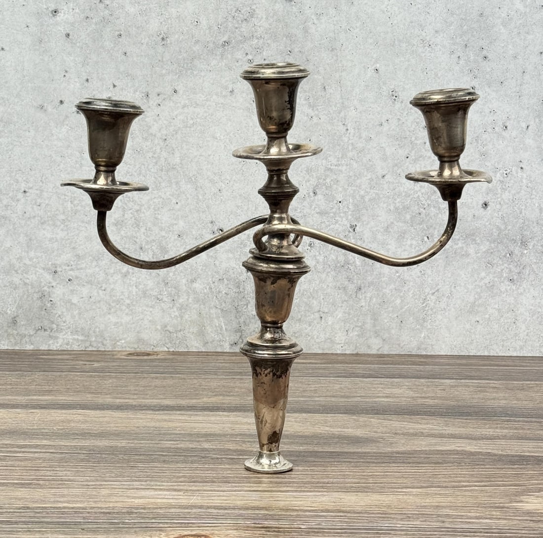 Weighted Sterling Silver Candlestick: 11 1/2" by 10 1/2" by 4 1/4".