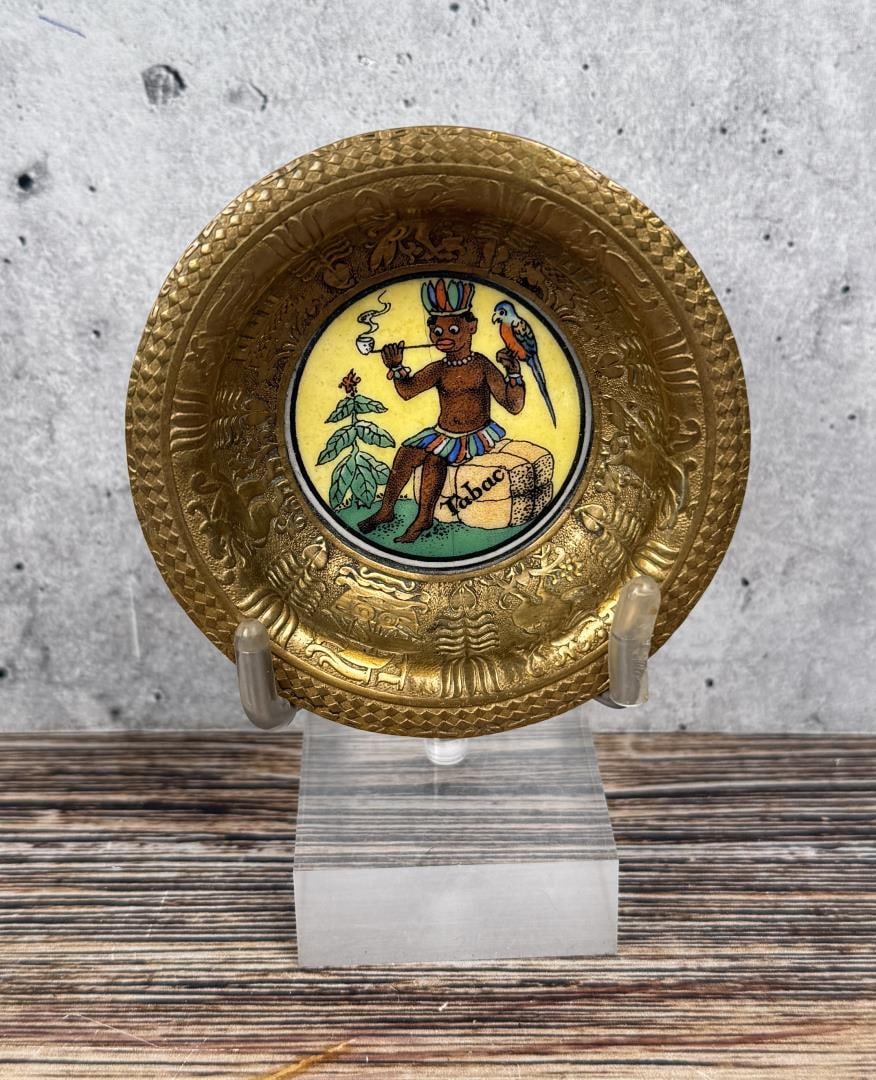 Unusual Black American Brass Porcelain Ashtray: Porcelain insert is cracked. 2 3/4" diameter, 5/8" tall.