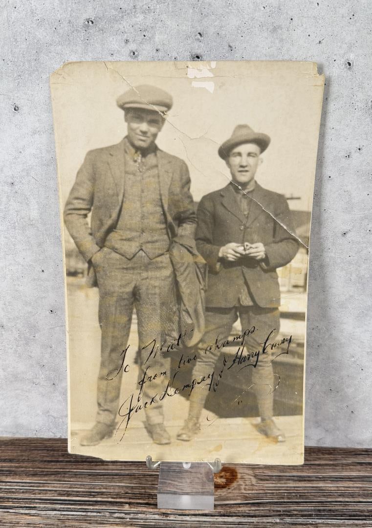 Jack Dempsey Harry Casey Signed Boxers Photo: 6 1/2" by 10 1/2" William Harrison "Jack" Dempsey (June 24, 1895 ? May 31, 1983), nicknamed Kid Blackie and The Manassa Mauler, was an American boxer who competed from 1914 to 1927, and world heavywei