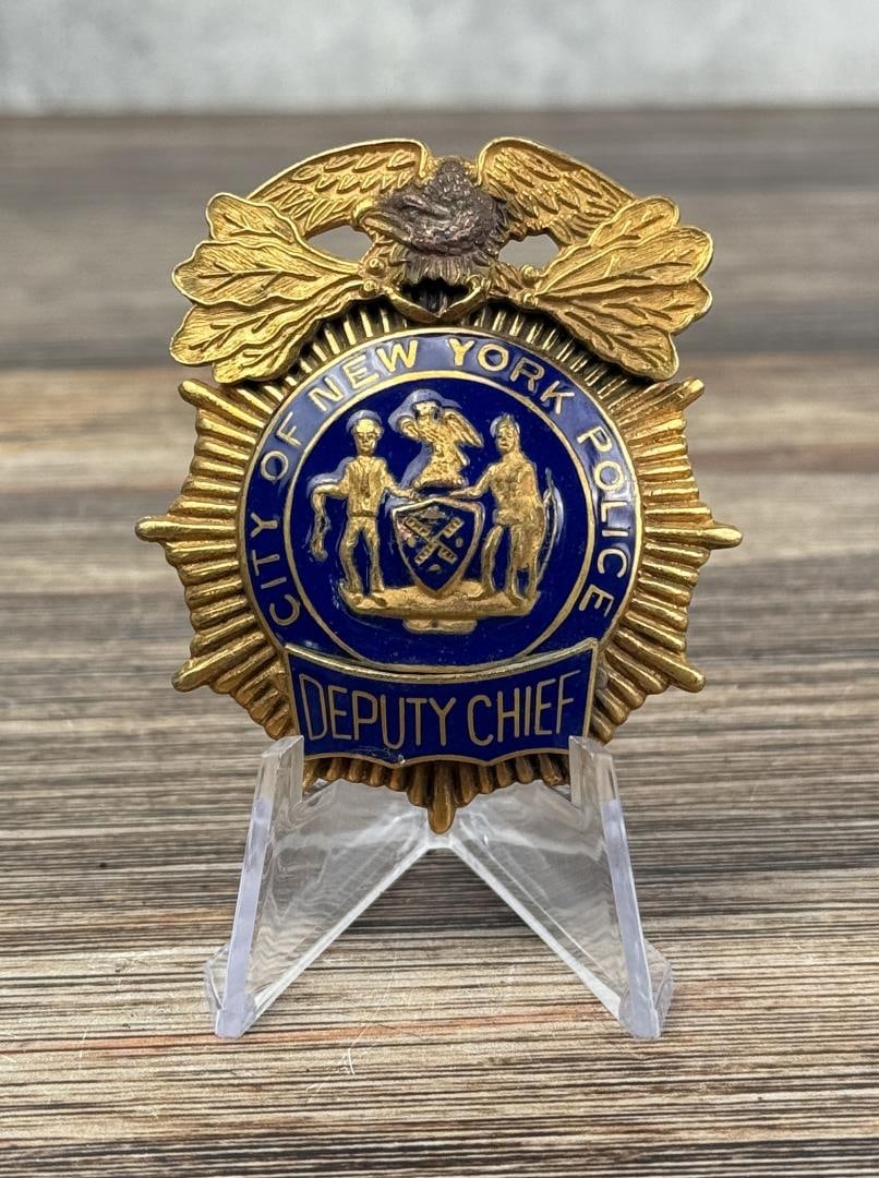 New York City Police Deputy Chief Badge: 2 1/2" long by 2 1/8" long.