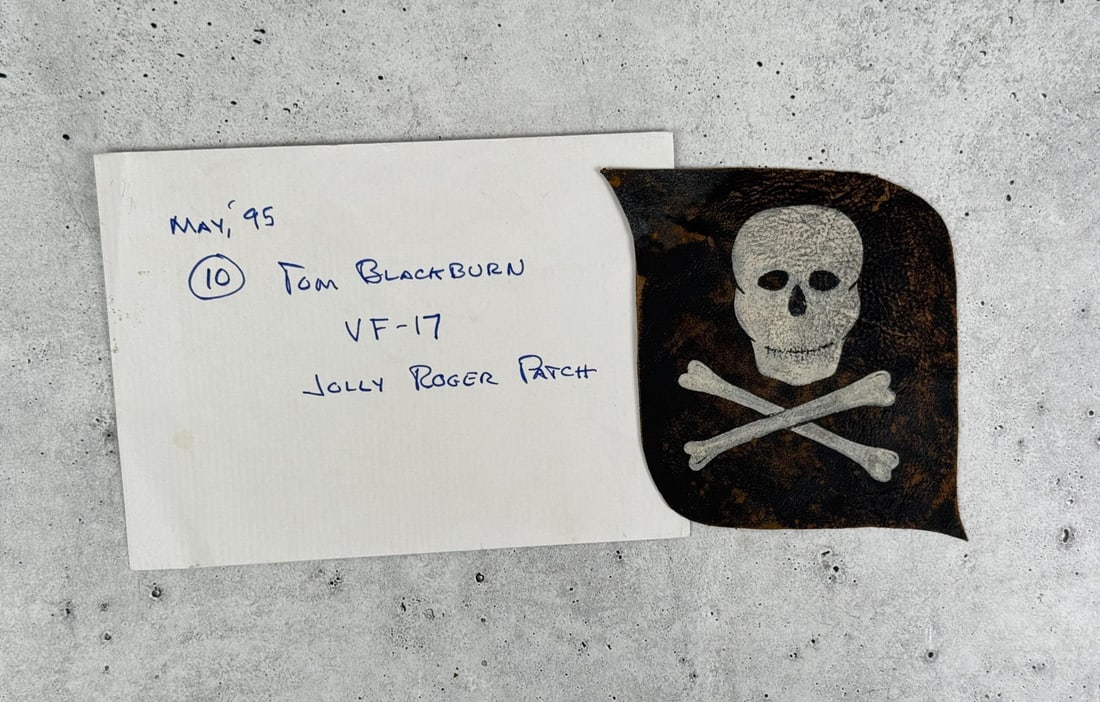 WW2 Hand Painted VF-17 Jolly Roger Patch: 5" by 4 1/2" John Thomas Blackburn (January 24, 1912 ? March 21, 1994) was an American naval aviator, World War II flying ace, and the first commanding officer of the famed F4U Corsair squadron VF-17
