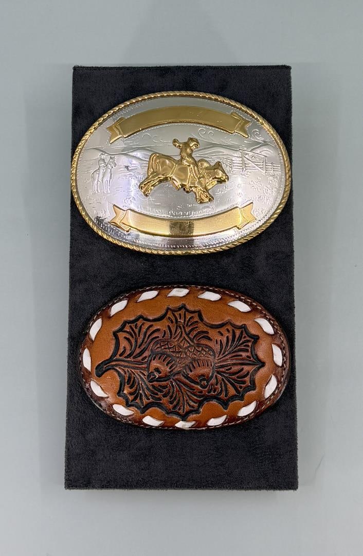 Tony Lama Cowboy Belt Buckles: Largest is 3 1/2" long.