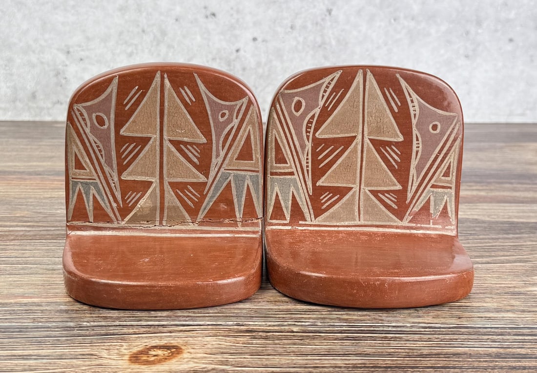 Madeline Tafoya Santa Clara Pueblo Bookends: 4 3/4" by 4 5/8" by 3 3/4". One is damaged and repaired.