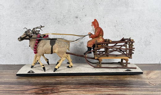 Antique German Santa Claus Reindeer Pull Toy: Estate Fresh. Some wear and minor damage a shown, antlers are misshapen. 19" by 8 3/4" by 5 3/4".