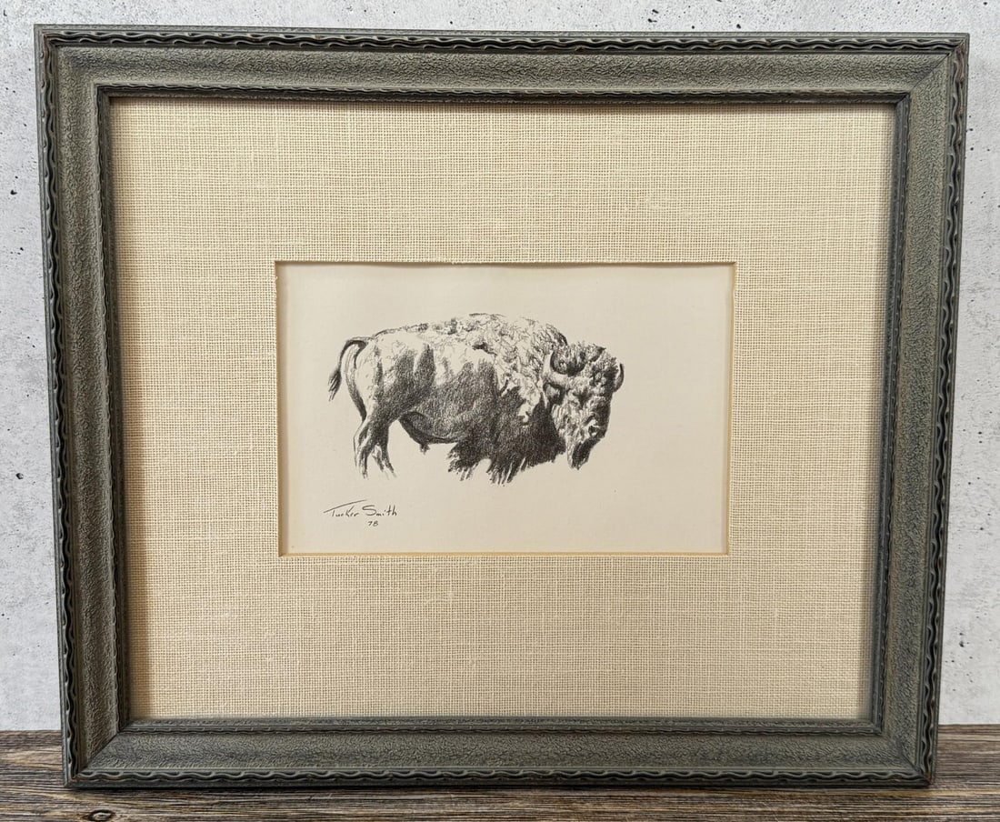 Tucker Smith Yellowstone Park Buffalo Drawing: Title is Yellowstone Park Buffalo. 4 1/2" by 7" unframed. 11 1/2" by 13 1/2" framed. Pencil on paper. Tucker Smith (Born 1940) is active/lives in Wyoming, Montana. Tucker Smith is known for Wildlife i