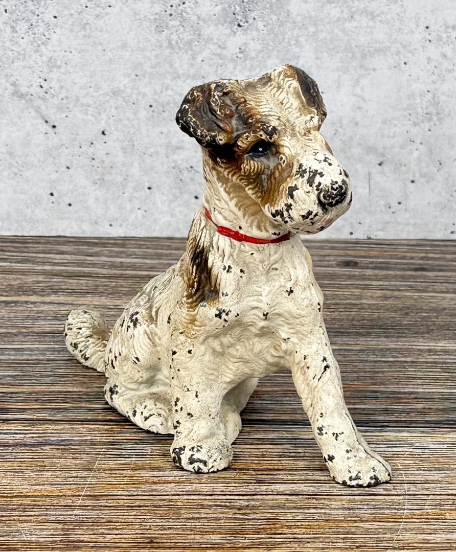 Hubley Cast Iron Fox Terrier Door Stop: 5 1/2" long by 4 5/8" tall by 2 1/4" wide. Nice original paint.