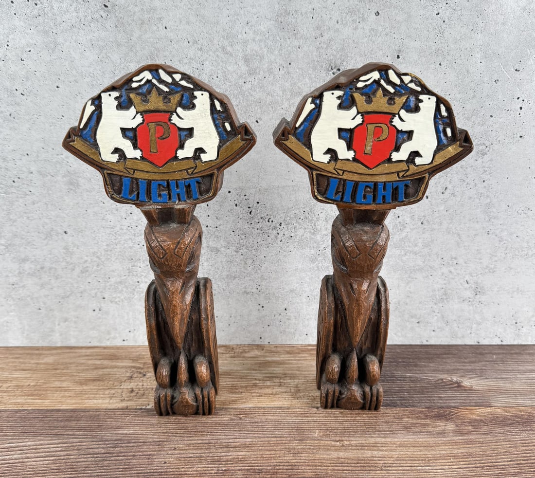 Prinz Brau Light Beer Totem Pole Tap Handle: Wooden handle pair. 9 1/8" long. Brewed in Anchorage Alaska.