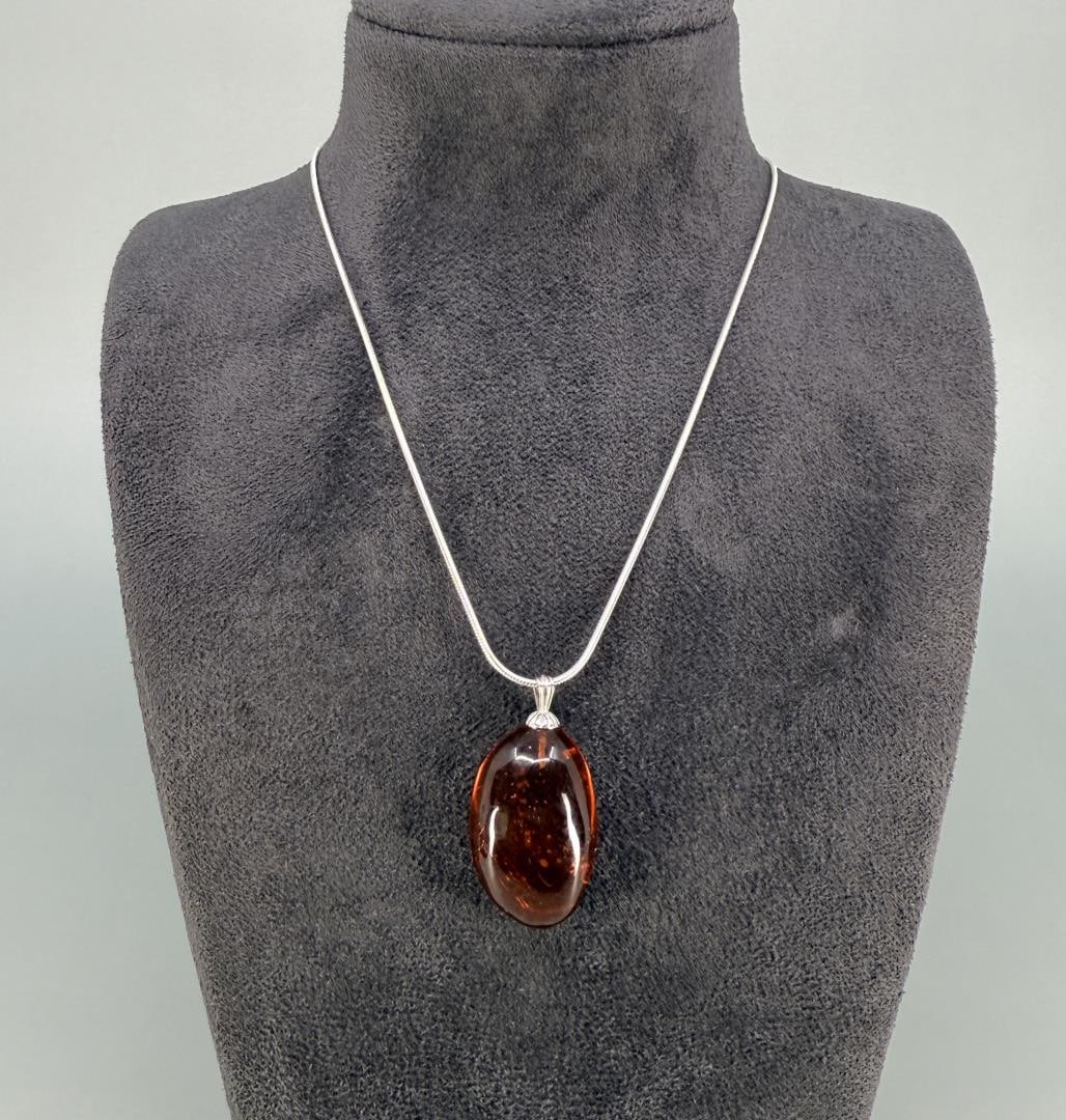 Sterling Silver Baltic Amber Necklace: 10 1/8" long closed.