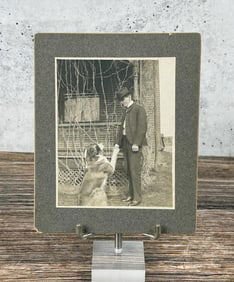 Man Shaking Dog Hand Montana Cabinet Photo