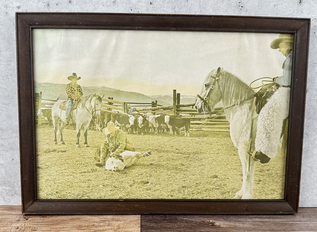 Roping a Calf Montana Cowboy Lithograph: 10 5/8" by 14 3/4" framed.