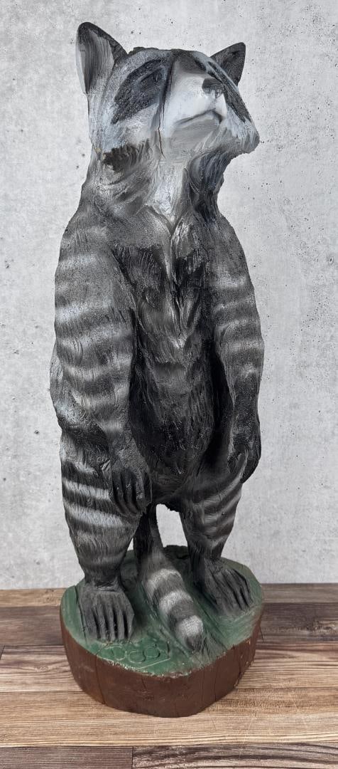 D Coy Chainsaw Carved Raccoon: 36" tall, 12" diameter.