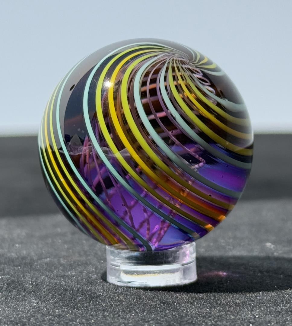 Kris Parke Art Glass Marble: 1 1/2" diameter. Signed and dated 2009. Kris Parke is a distinguished American glass artist celebrated for his innovative and visually captivating art marbles. Based in northeastern Ohio, Parke has be
