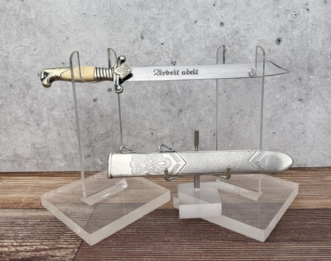 WW2 German RAD Officer Dagger: Post war manufacture. 9 7/8" long by 1 7/8" wide at guard.