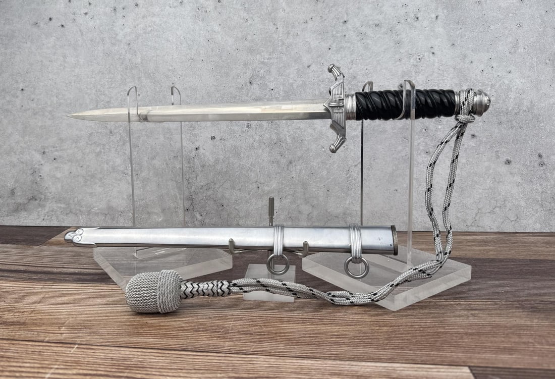 WW2 German Railway Protection Leader Dagger: Carl Eickhorn, with portepee. 14 1/2" long. Aluminum fittings with a steel throat. Knot is believed to be post war. I have looked over this dagger a handful of times, it is being sold as-is, I cannot