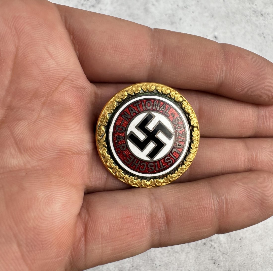 WW2 German NSDAP Gold Party Badge: Numbered 5653. 1 1/8" diameter. Deschler & Sohn.