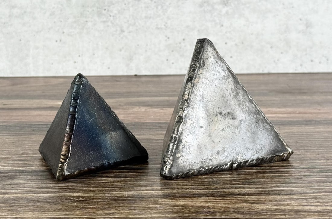 Mid Century Brutalist Metal Triangle Bookends: Largest is 4 3/8" by 4" by 3 5/8"