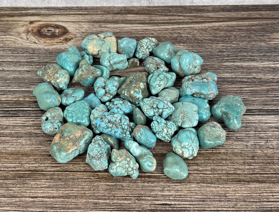 1lb of Turquoise Blue Howlite Nuggets: One pound bag.