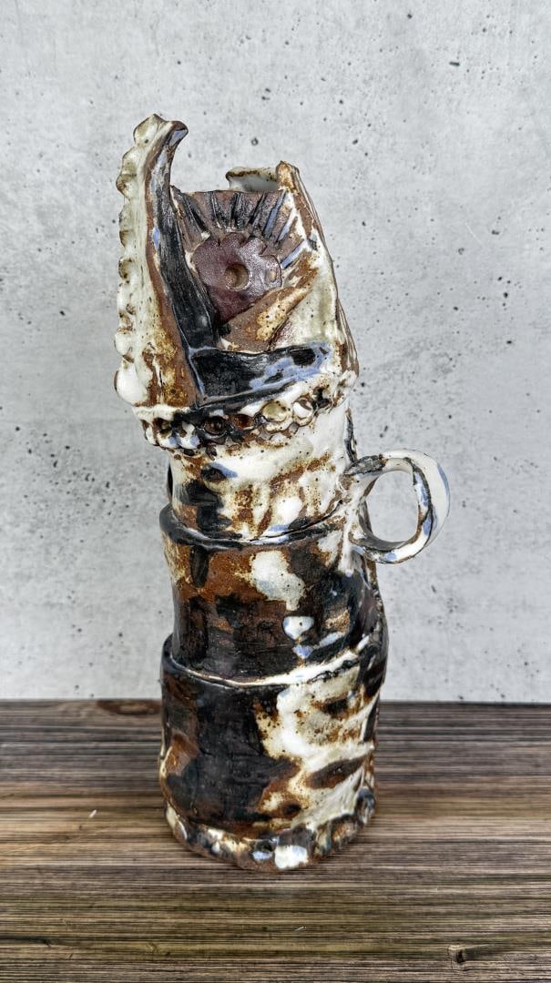 Peter Voulkos Montana Studio Pottery Handled Vase: 10 1/2" by 4 5/8" by 3 5/8". Unsigned. Peter Voulkos (1924 - 2002) was active/lived in California. Peter Voulkos is known for Sculptor-ceramic, abstraction. Peter Voulkos 1924?2002. Few artists can re
