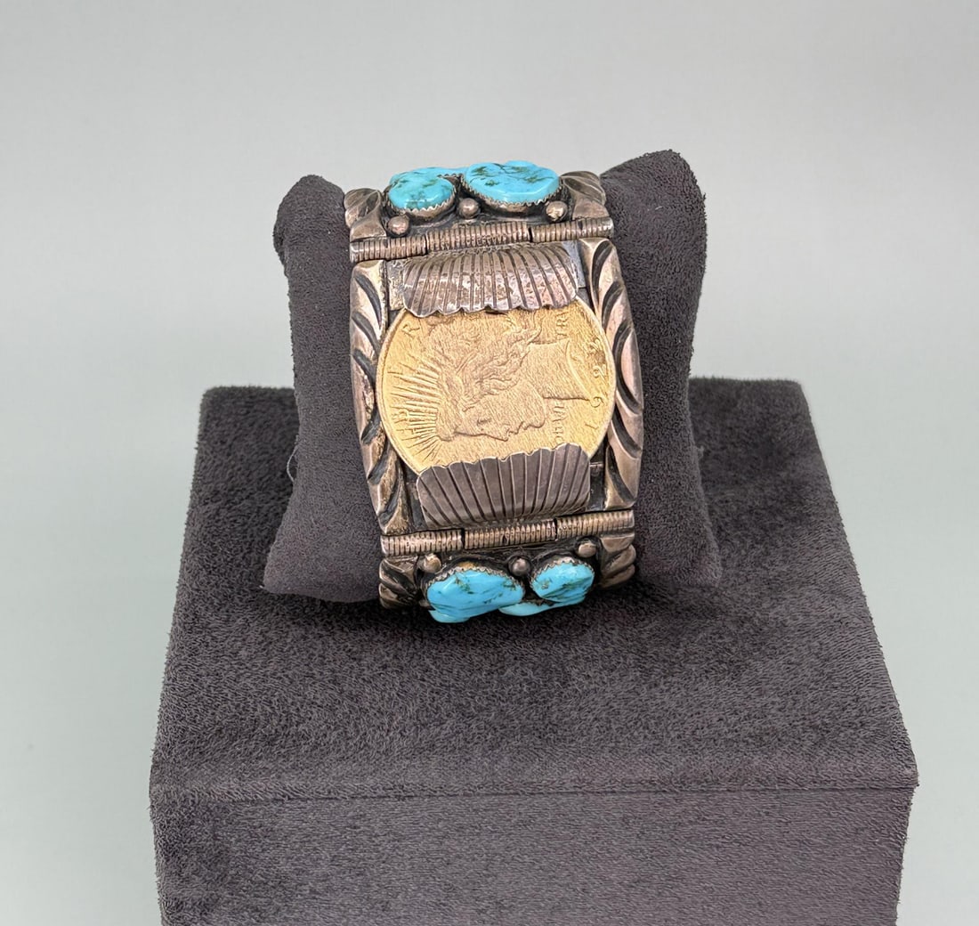 Ben Touchine Navajo Sterling Turquoise Bracelet: 143 grams. 3" round by 2 14" tall.