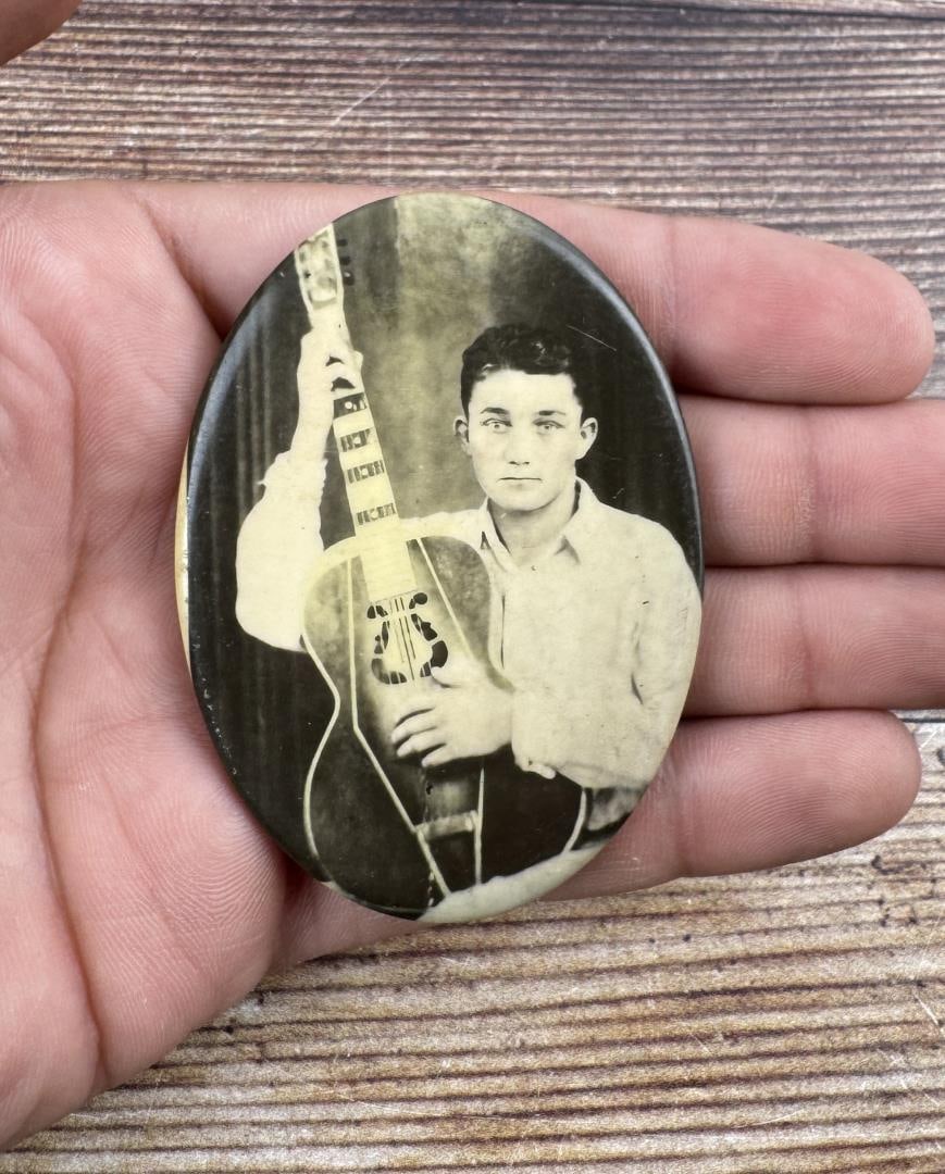 Boy with Dobro Guitar Celluloid Pocket Mirror: 2 5/8" long.