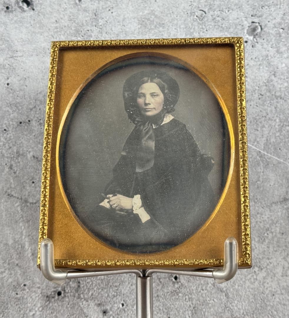 Antique Daguerreotype Photo Woman in Bonnet: 3 1/4" by 2 3/4" in frame. She is also holding a pen, possibly a writer.