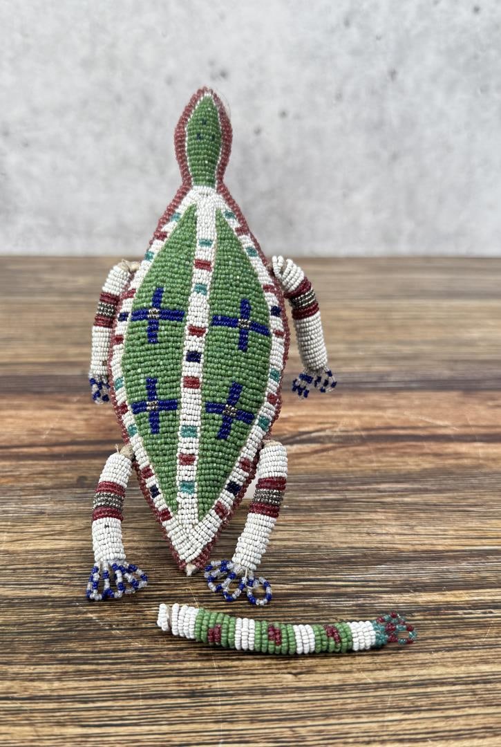 Plains Native American Indian Beaded Fetish: Lizard form, reversible, beaded on both sides. 6 1/2" long without tail. Tail detached as shown. Last Quarter of the 19th Century to First quarter of the 20th Century.