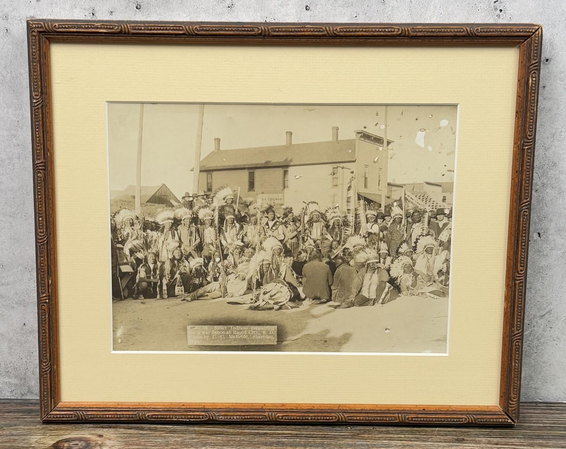 Sioux Indians Preparing for War Dance Photo: Sioux Indians Preparing for a War Dance at Rapid City South Dakota. Photo by C.C. Mcbride, Sheridan Wyoming. 10" by 12 1/4" framed.