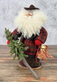 Cowboy Santa With Saddle Christmas Figure