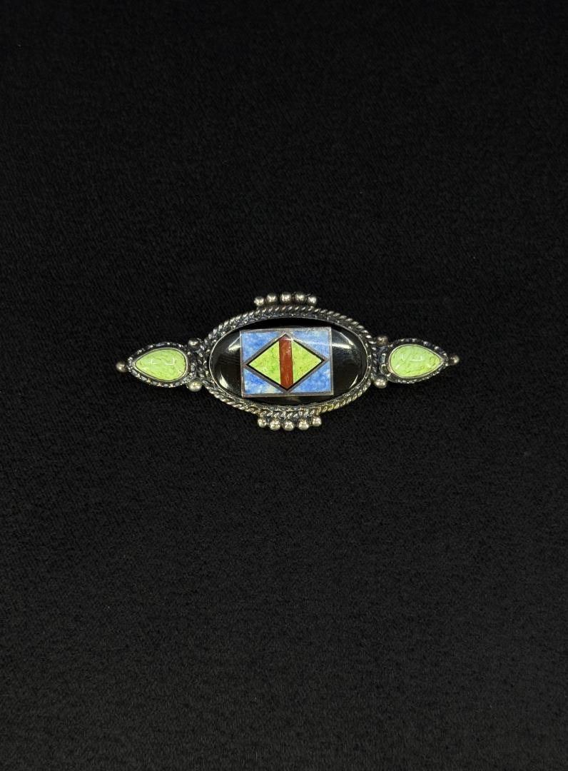 Zuni Inlaid Sterling Silver Brooch: 2 1/8" long.