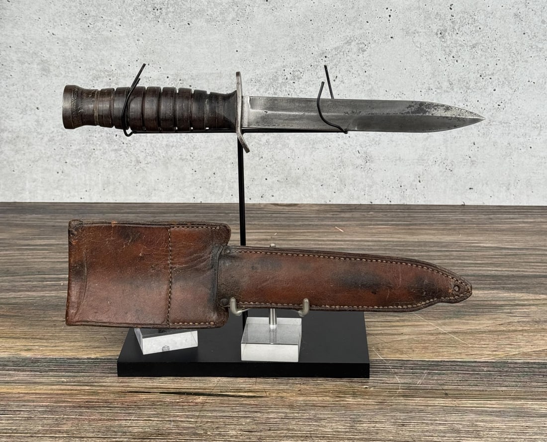 WW2 US M3 Sterile Fighting Knife: 11 3/8" long overall. End of pommel has an Ordnance bomb stamp.