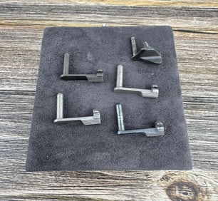 Group of Colt 1911 Pistol Slide Stops